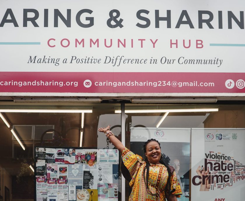 CAS CEO standing in front of the CAS Hub in Rochdale, representing community support and wellbeing initiatives.