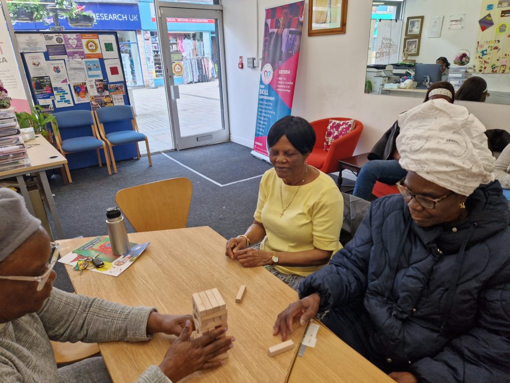 Elderly community members connecting at CAS befriending program in Rochdale