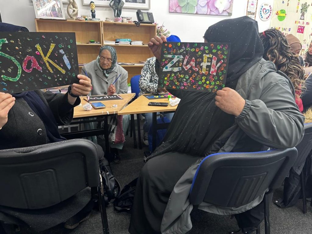 Women exploring grounding activities during Creative Connection session