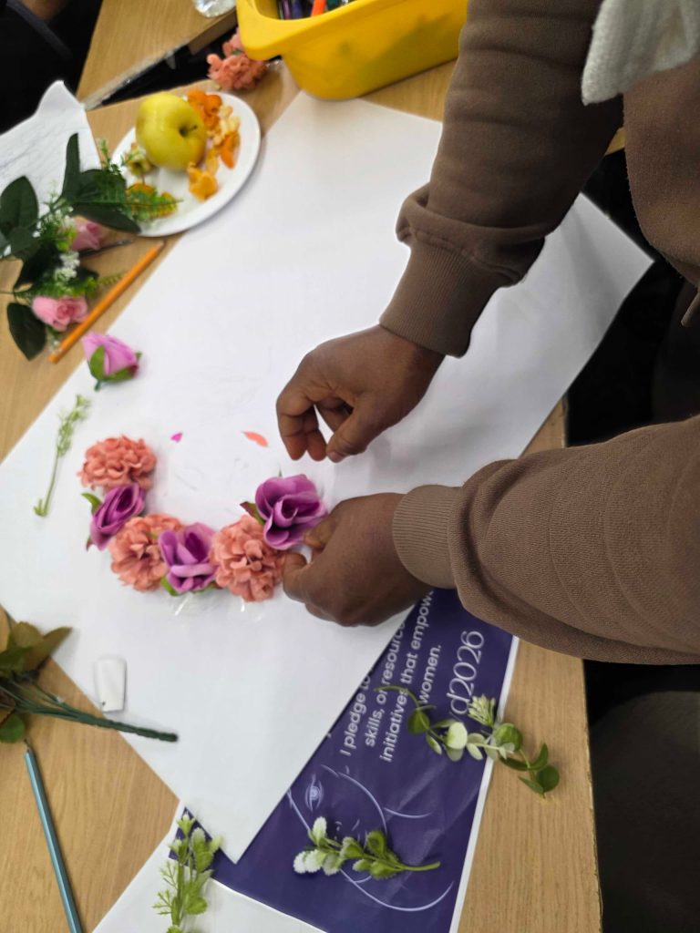 From vision to reality: Every hand-placed detail on these community posters represents the individual contributions that, together, create a lasting social impact.