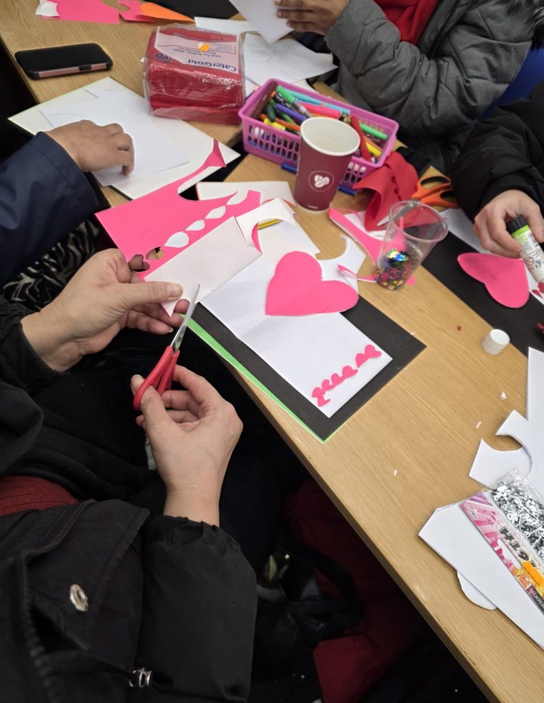 Participant engaged in Creative Connection community engagement workshop at CAS