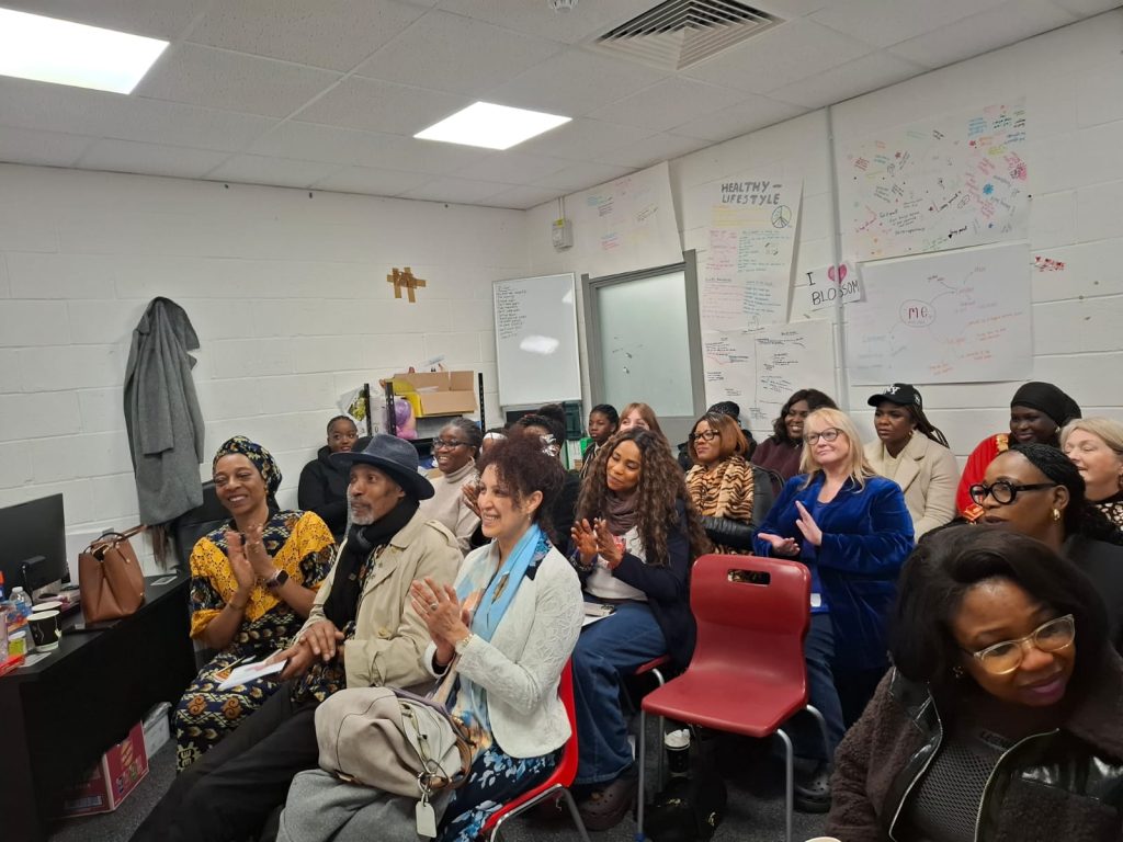 Engaged audience attending Central Manchester Hub launch, reflecting strong community participation and support