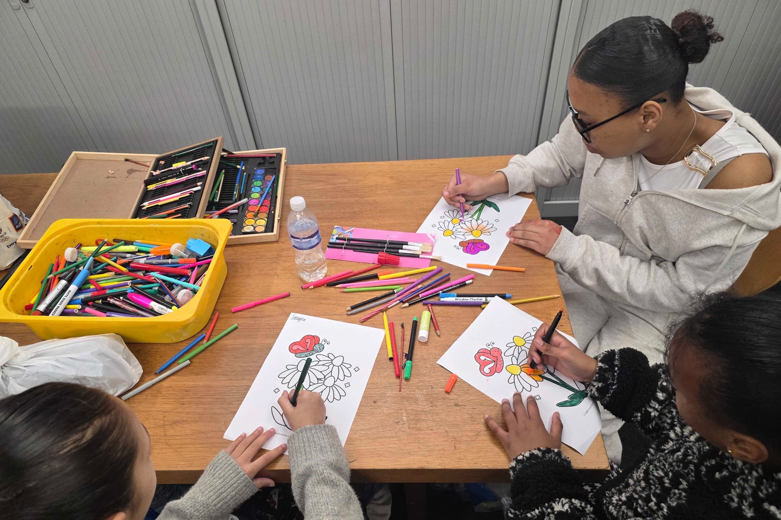 Children engaging in creative art activities during CAS Easter Holiday Activities Programme