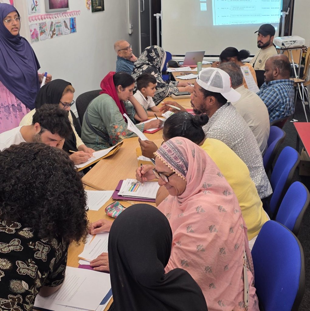 Learners participating in reading, writing or group activities.