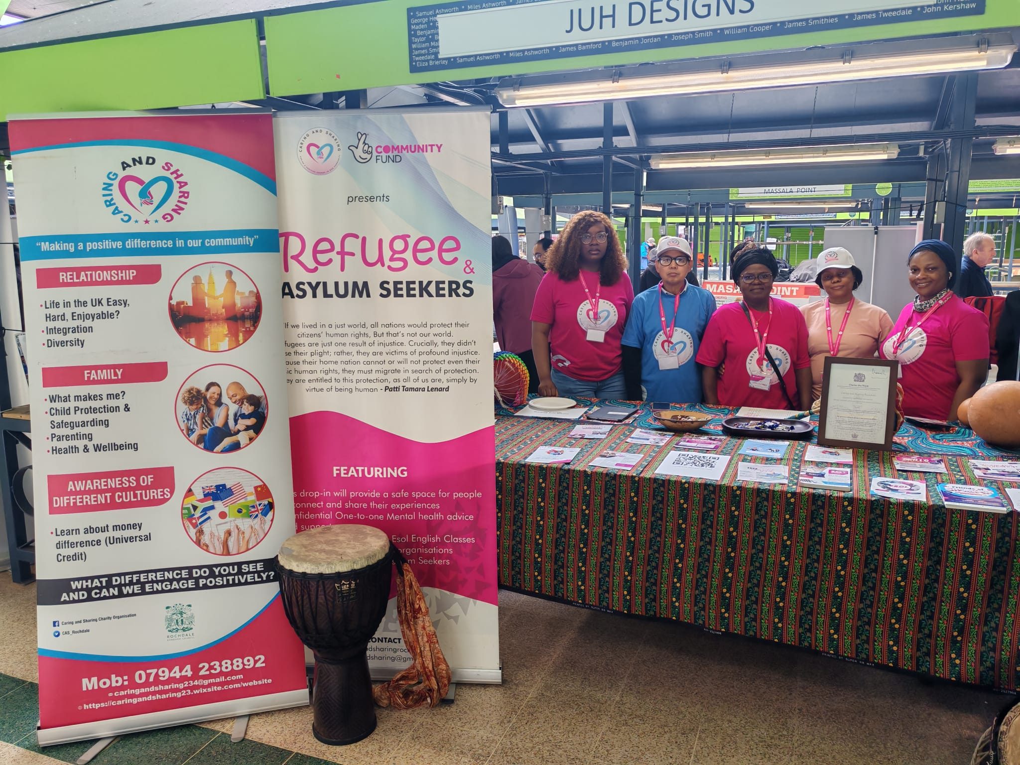 Caring and Sharing Rochdale team at Rochdale Volunteer Fair 2026 engaging with community members at event stand