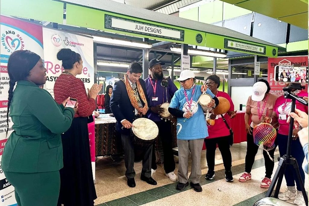 Civic leaders, including the Mayor and Mayoress of Rochdale, with Caring and Sharing Rochdale staff and volunteers at the Volunteer Fair 2026