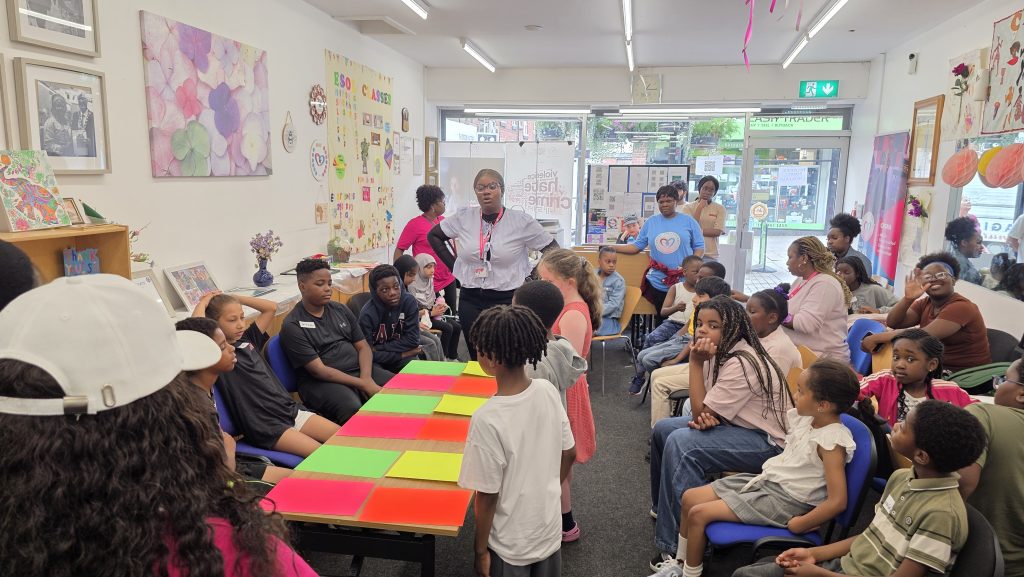 Children taking part in Summer HAF activities such as arts and crafts, games, creative sessions, or other fun group activities with the CAS team and volunteers.