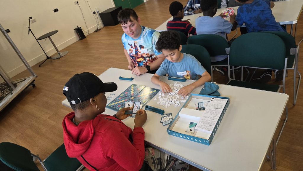 Children taking part in a Minute-to-Win-It challenge during HAF 2026