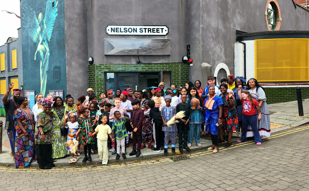 Children and Caring and Sharing Rochdale staff outside Nelson Street Church during the Summer HAF Programme