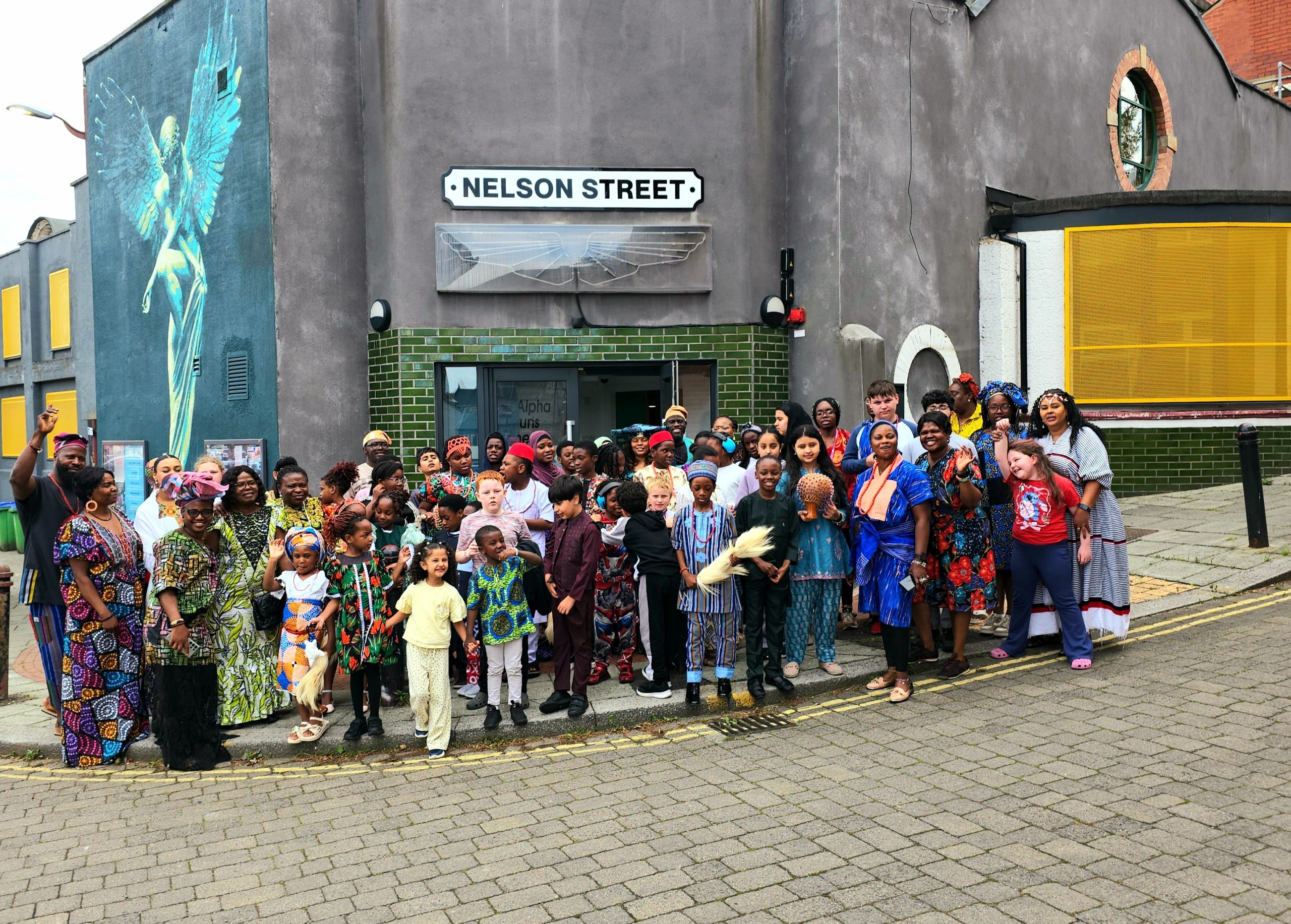 Children and Caring and Sharing Rochdale staff outside Nelson Street Church during the Summer HAF Programme